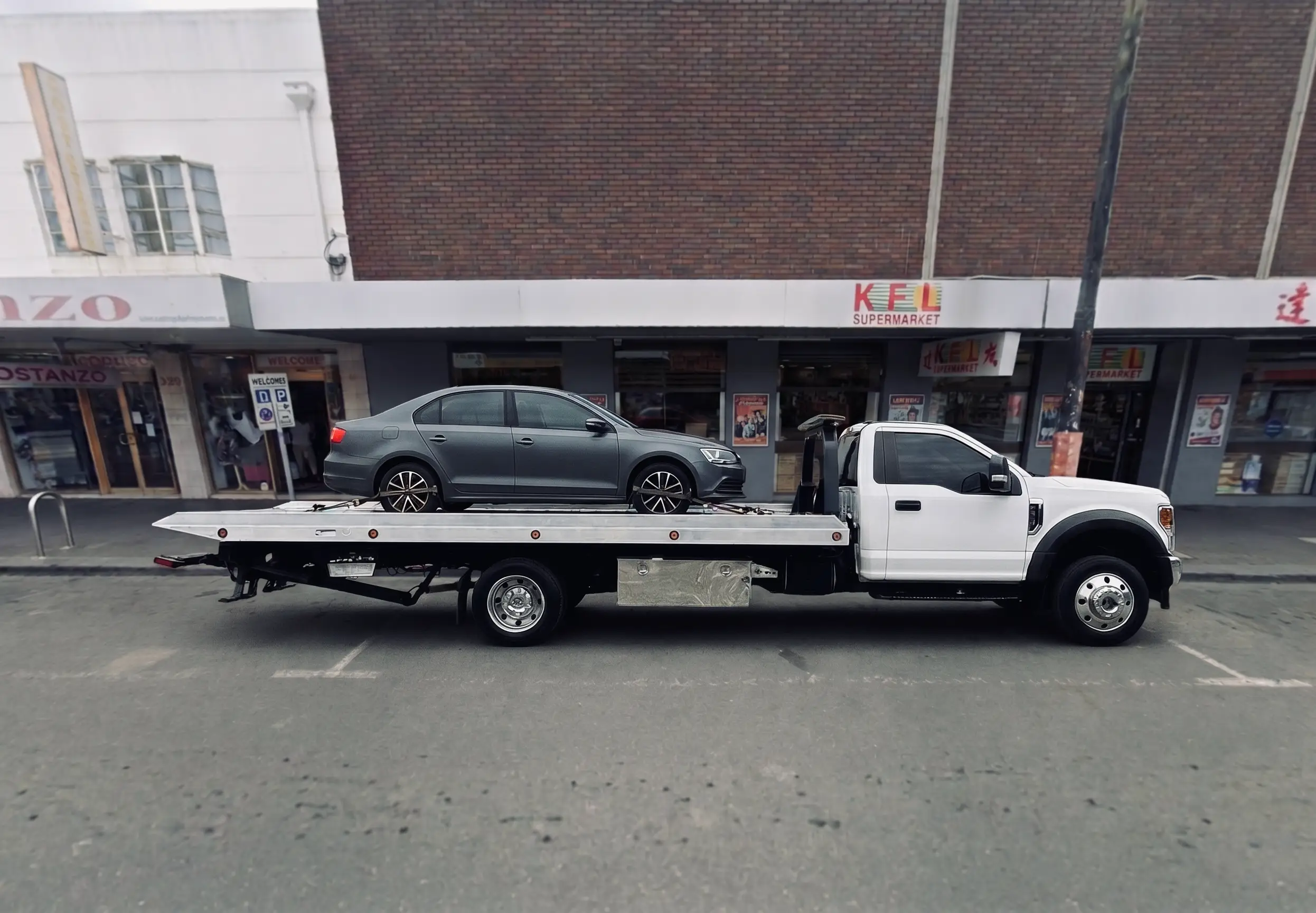 Car breakdown loaded in tow truck in Coburg